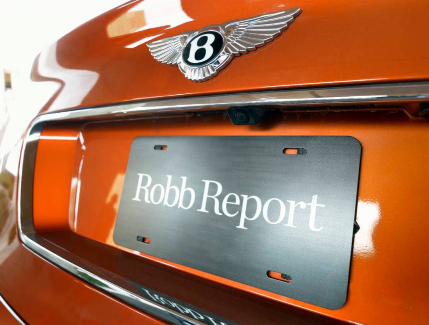 Bill Hughes Real Estate Millions The back of a 2019 Bentley Bentayga Speed shows a Robb Report ...