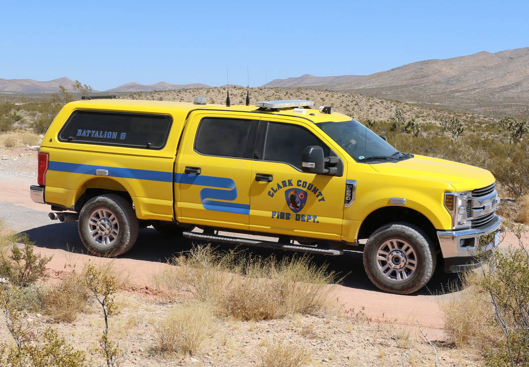 An emergency vehicle is seen near Goodsprings, southwest of Las Vegas, where a hot air balloon ...