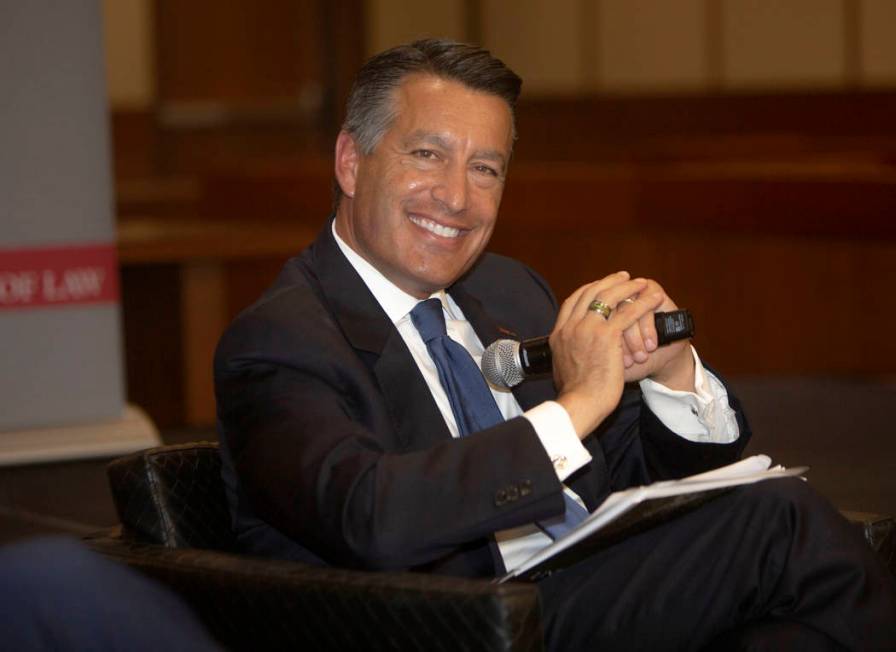 Former Nevada Gov. Brian Sandoval smiles during the Nevada Senators Panel at UNLV, Thursday, Se ...