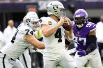 Oakland Raiders offensive tackle Kolton Miller (74) misses his block on Minnesota Vikings defen ...