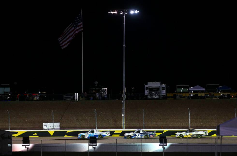 Drivers compete during the NASCAR World of Westgate 200 Truck Series auto race at the Las Vegas ...