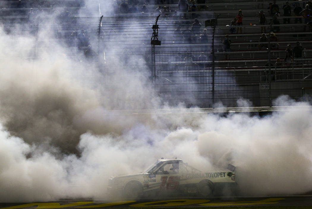 Austin Hill celebrates his win with a burnout at the NASCAR World of Westgate 200 Truck Series ...