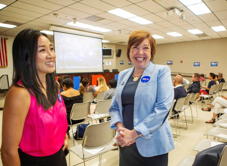 Michelle Kwan, two-time Olympic figure skating medalist, left, talks with Nevada Assemblywoman ...