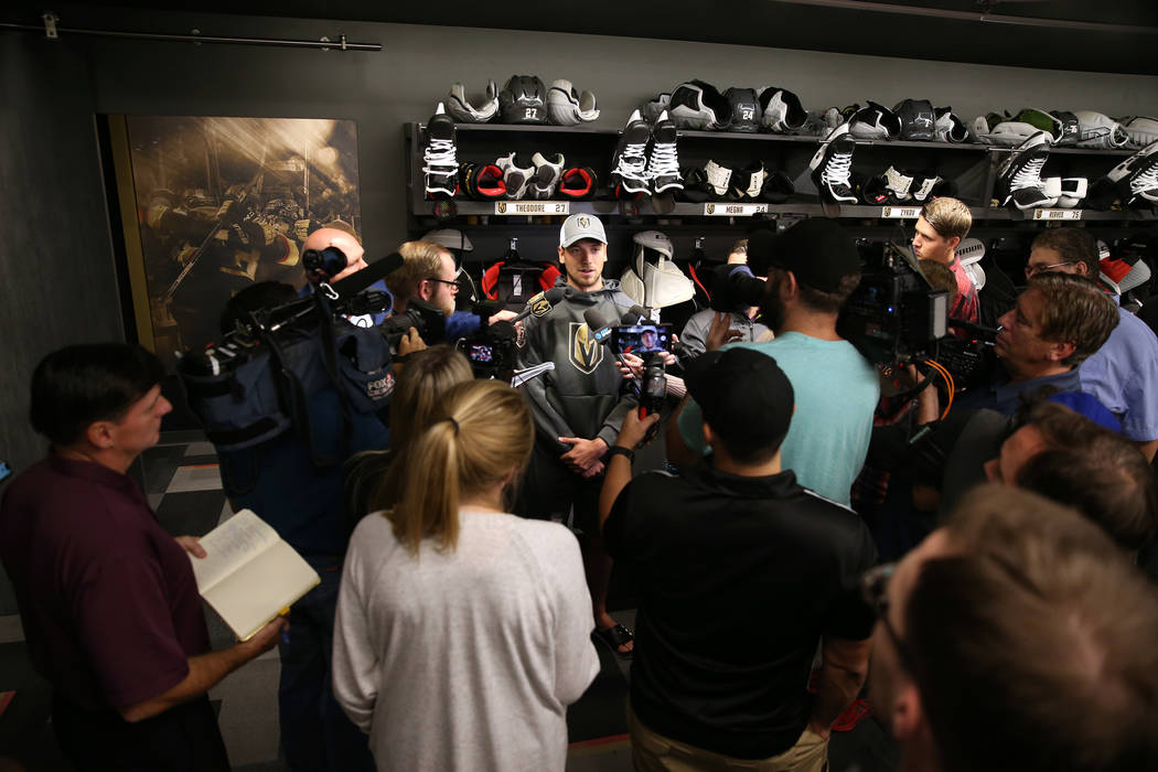 Vegas Golden Knights defenseman Shea Theodore (27) speaks to reporters at City National Arena i ...