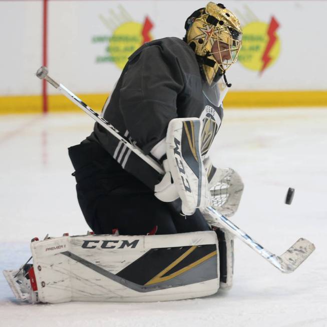 Vegas Golden Knights goaltender Marc-Andre Fleury (29) blocks a shot during a team practice at ...