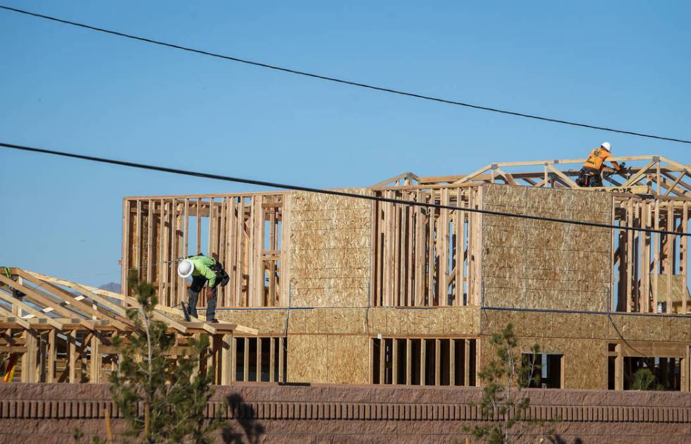 Construction under KB Home continues at the Desert Mesa neighborhood in North Las Vegas, Monday ...