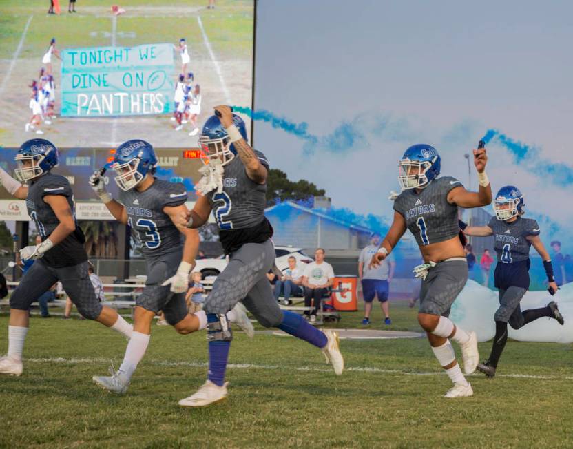 Green Valley players take the field before the start of the Gators home matchup with Palo Verde ...