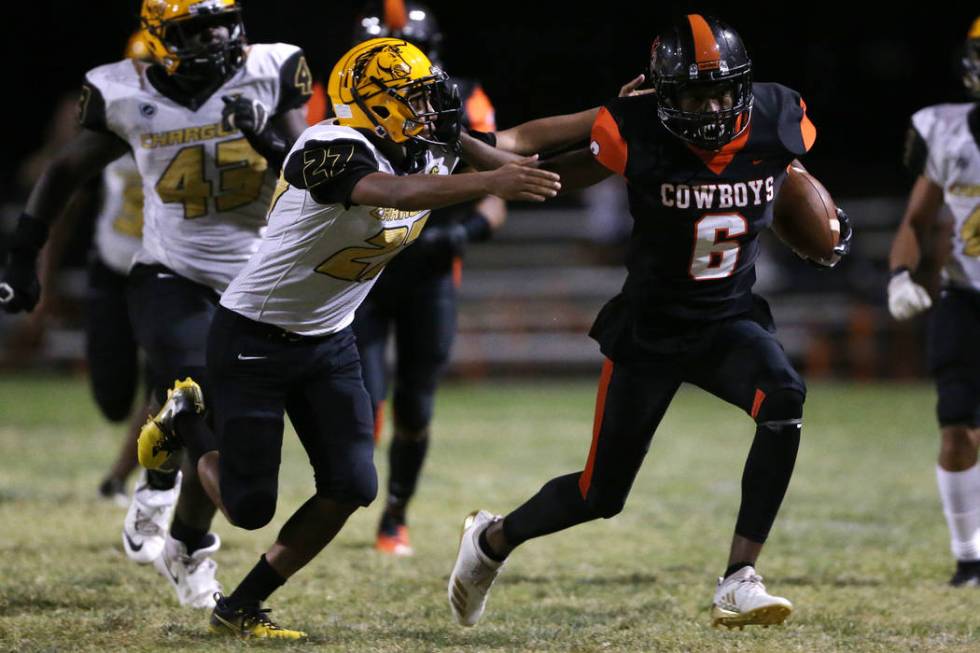 Chaparral's Al Caesar (6) runs the ball against Clark's Dominick Phillips (27) in the second qu ...