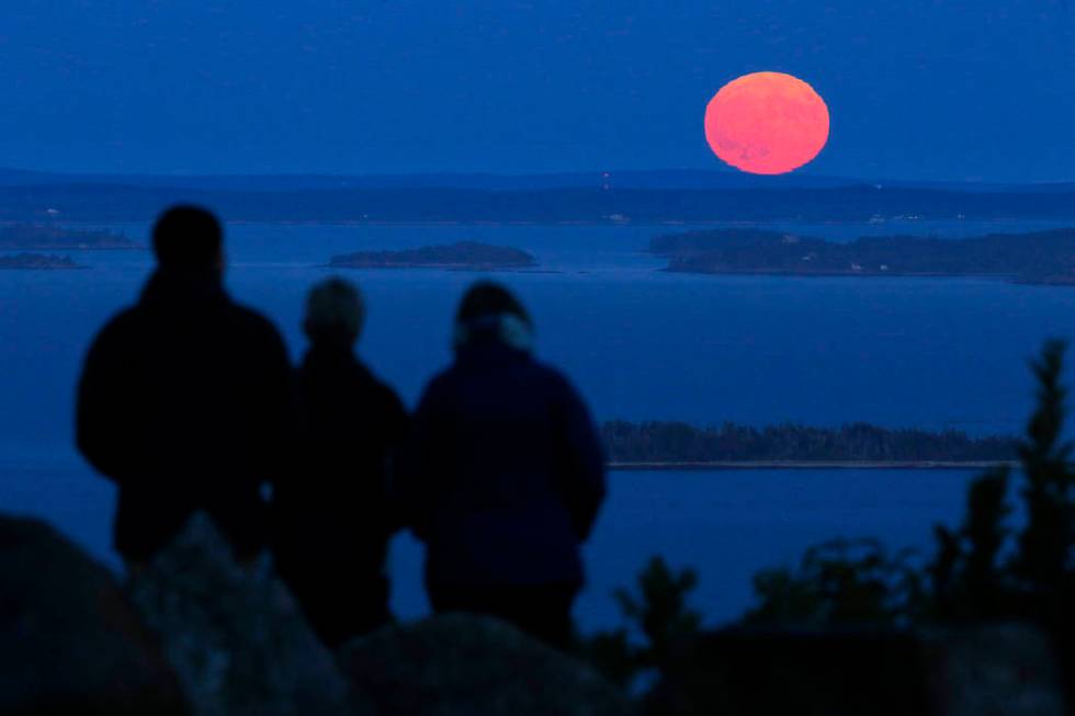 Jack and Kathy Duepree, of Camden, Maine, left and center, and their friend Betsy Starman, of N ...