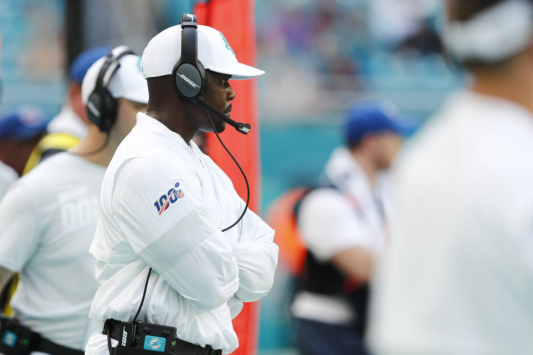 Miami Dolphins head coach Brian Flores looks from the sidelines, during the second half at an N ...