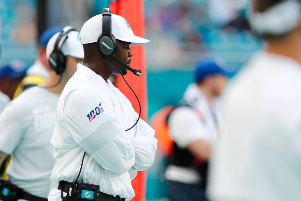 Miami Dolphins head coach Brian Flores looks from the sidelines, during the second half at an N ...