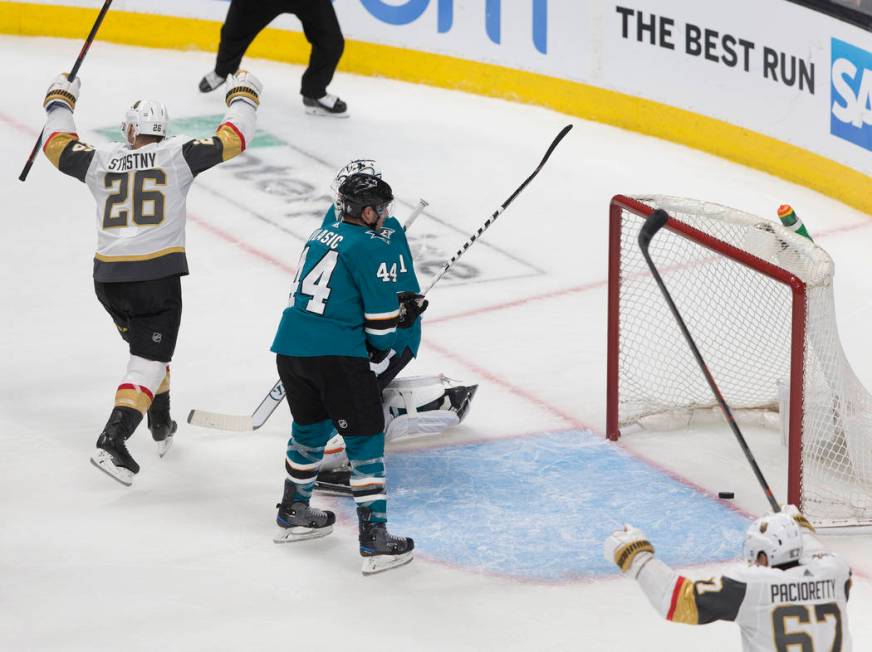 Golden Knights center Paul Stastny (26) celebrates with teammate Max Pacioretty (67) after a th ...