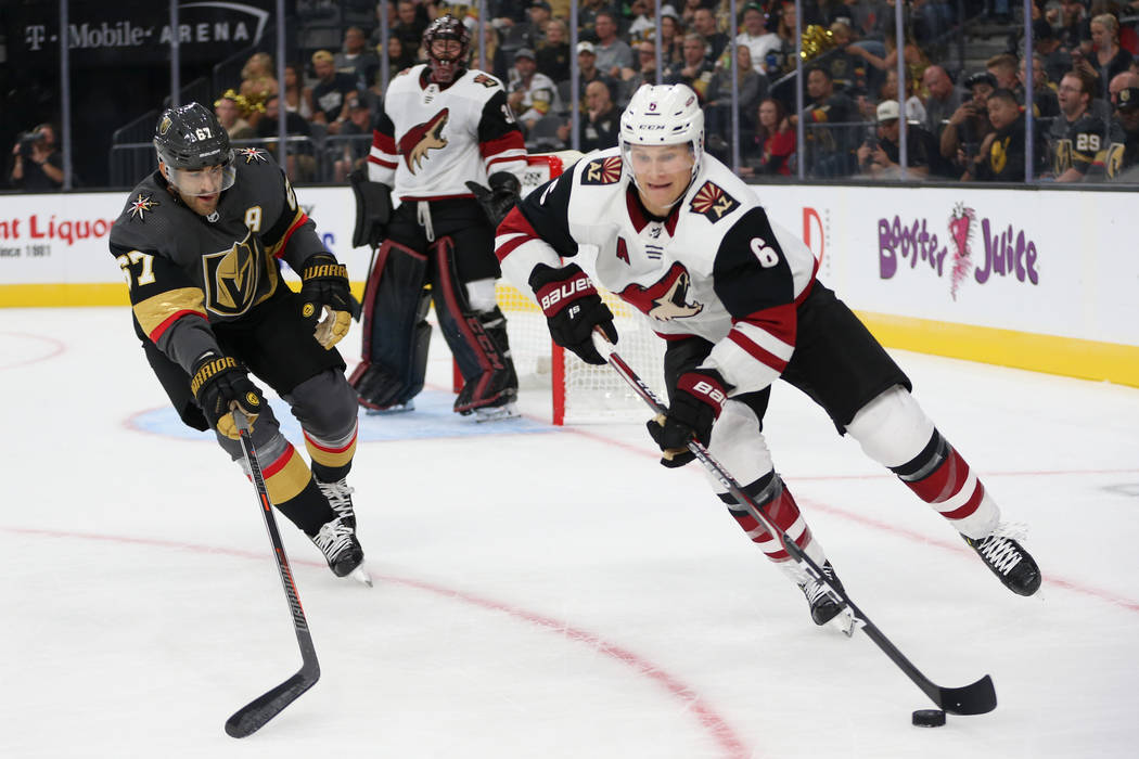 Vegas Golden Knights left wing Max Pacioretty (67) defends against Arizona Coyotes defenseman J ...