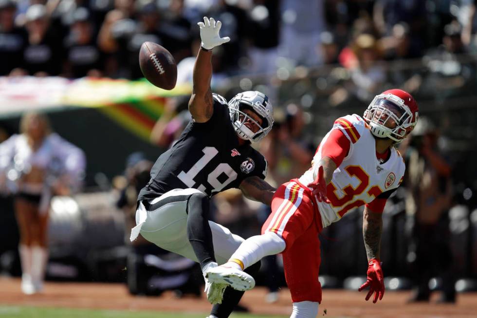 Oakland Raiders wide receiver Ryan Grant (19) goes up for a pass as Kansas City Chiefs strong s ...