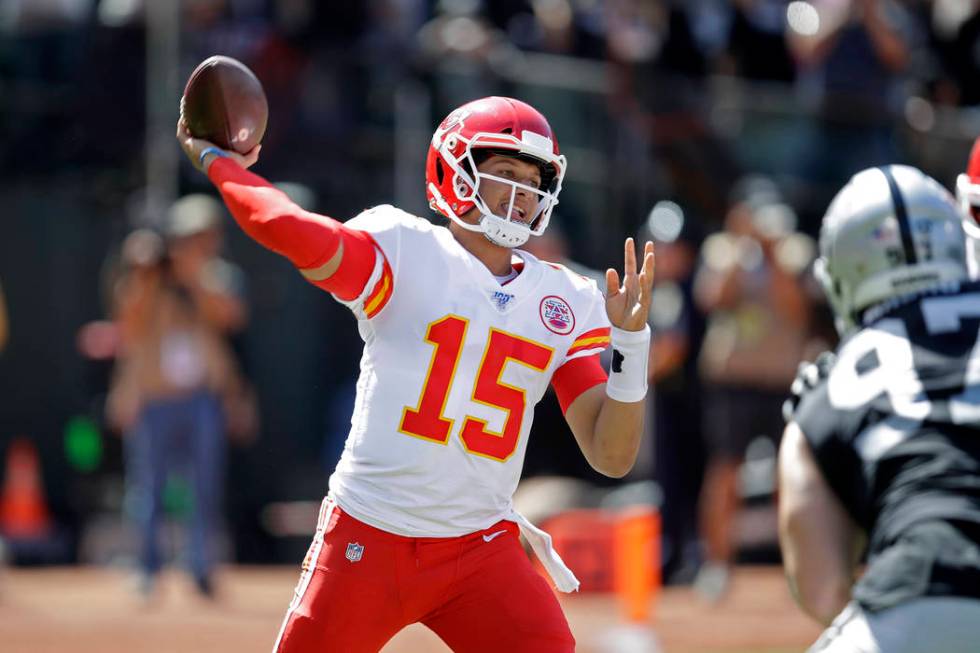 Kansas City Chiefs quarterback Patrick Mahomes during the first half of an NFL football game ag ...