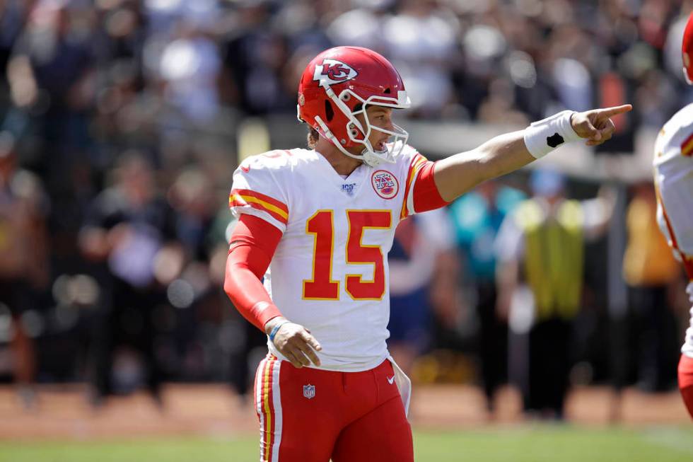 Kansas City Chiefs quarterback Patrick Mahomes calls a play during the first half of an NFL foo ...