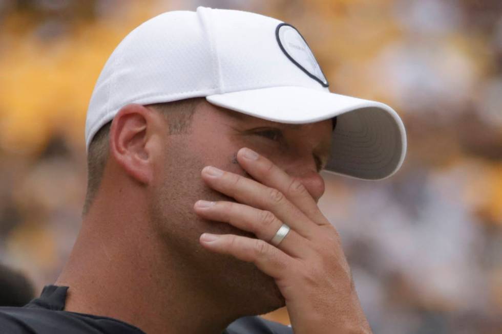 Pittsburgh Steelers quarterback Ben Roethlisberger stands on the sideline as the team plays aga ...