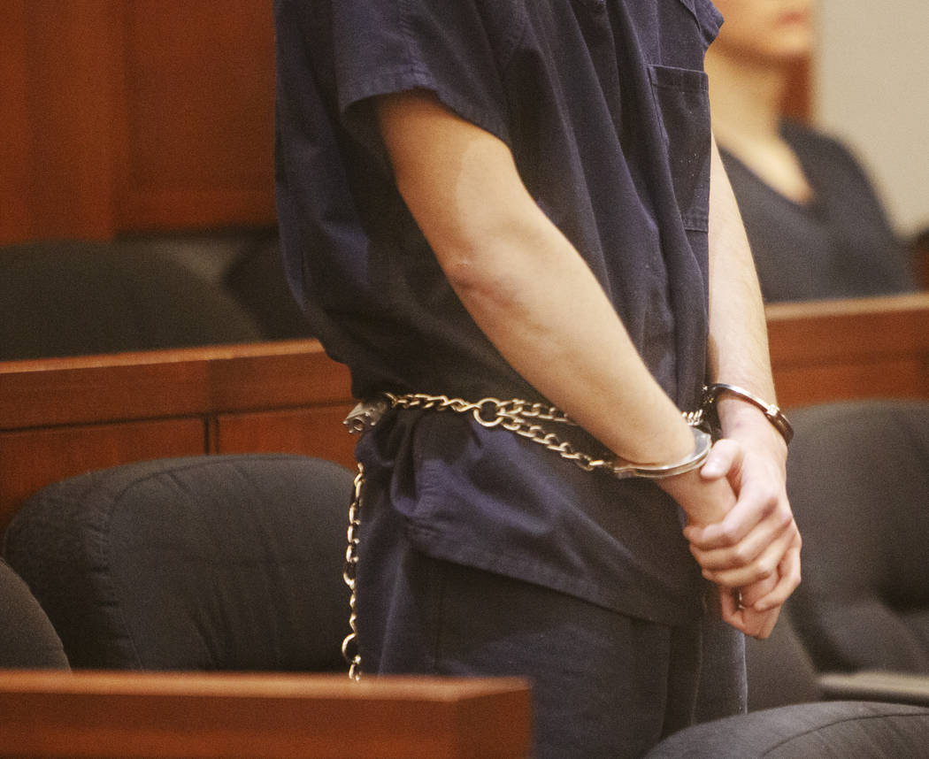 Alexander Brewer stands during his sentencing regarding a DUI crash that killed Garrett Meriwet ...