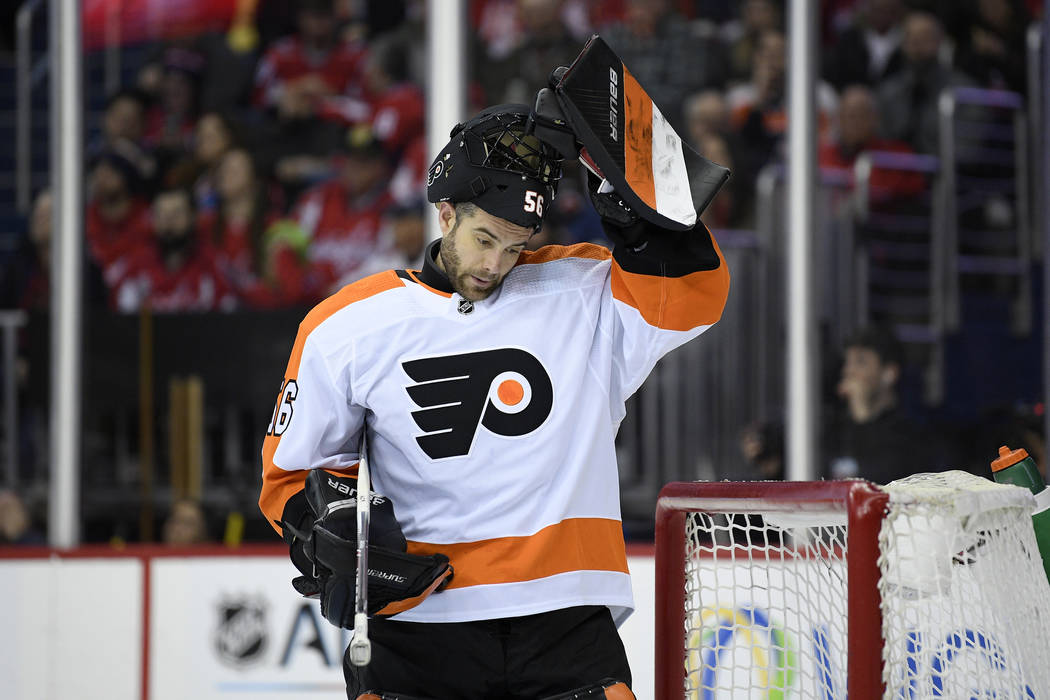 Philadelphia Flyers goaltender Mike McKenna (56) stands on the ice during the second period of ...