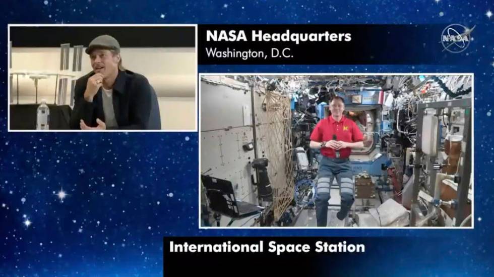 In this image taken from NASA video actor Brad Pitt, left, star of the new space movie “ ...