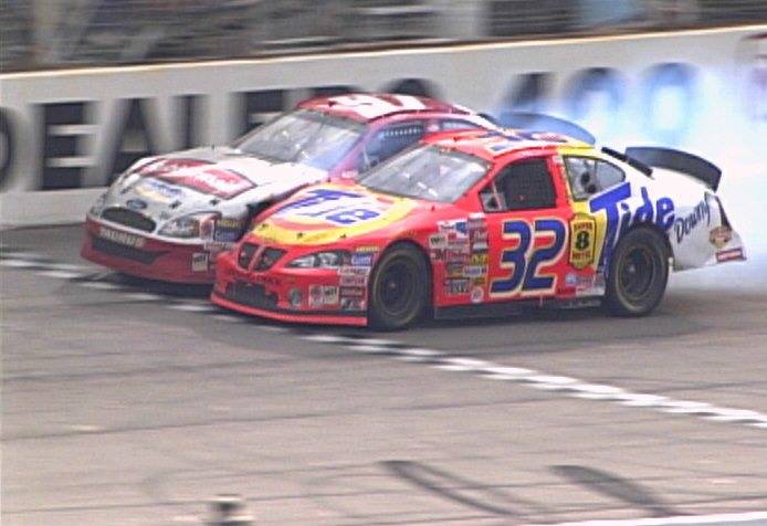 This image retrieved from the NASCAR scoring camera shows Ricky Craven (32) beating Kurt Busch ...
