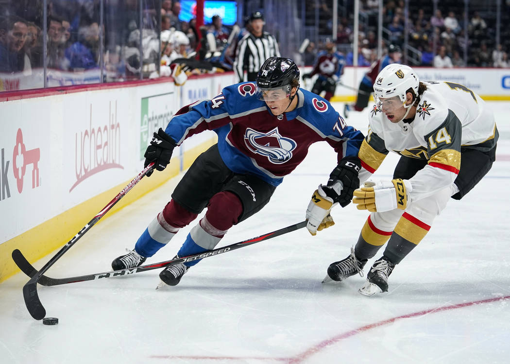 Colorado Avalanche right wing Alex Beaucage (74) skates against Vegas Golden Knights defenseman ...