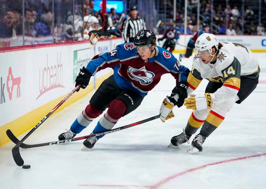 Colorado Avalanche right wing Alex Beaucage (74) skates against Vegas Golden Knights defenseman ...