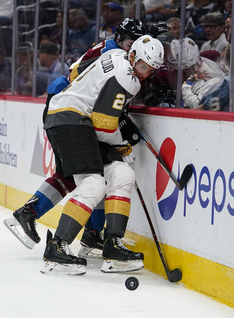 Vegas Golden Knights defenseman Zach Whitecloud (2) and Colorado Avalanche center Jayson Megna ...