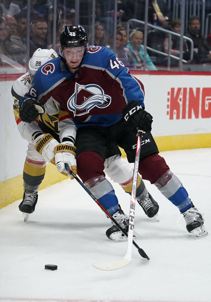 Colorado Avalanche defenseman Nicolas Meloche (46) edges out Vegas Golden Knights left wing Wil ...