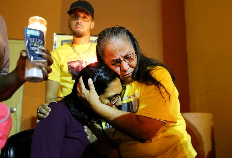 Maria Conchos, left, mother of Monet Garcia, comforted by her mother Josefina Conchos, during a ...