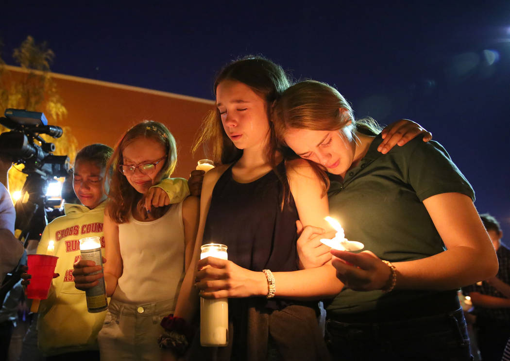 Monet Garcia's friends MacKenna Calvin, 12, from left, Diamond Espinosa, 12, Bailey Boman, 12, ...