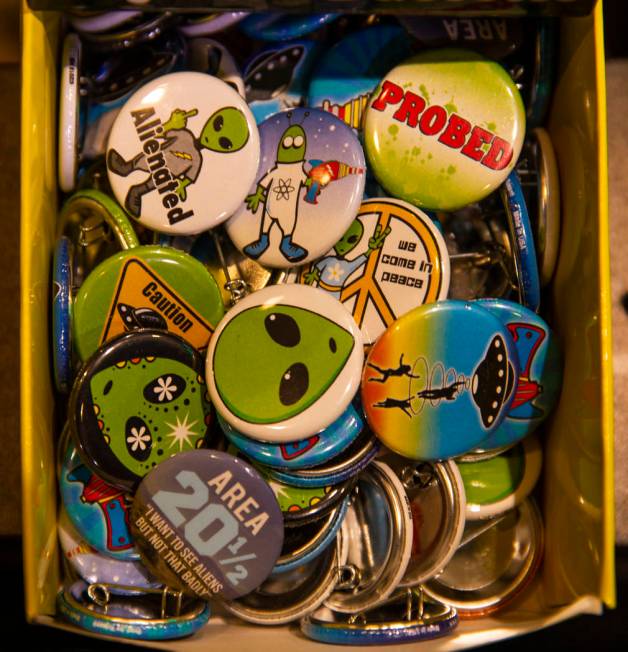 A box with alien-related buttons are for sale at the Alien Research Center which will host the ...
