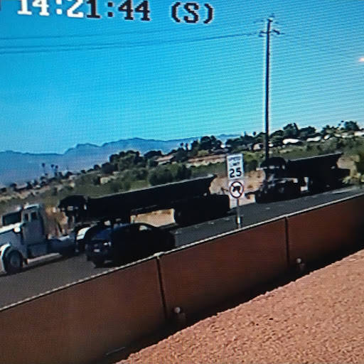 A screenshot from one of Trevor Schneider's security cameras shows truck traffic on South Valle ...