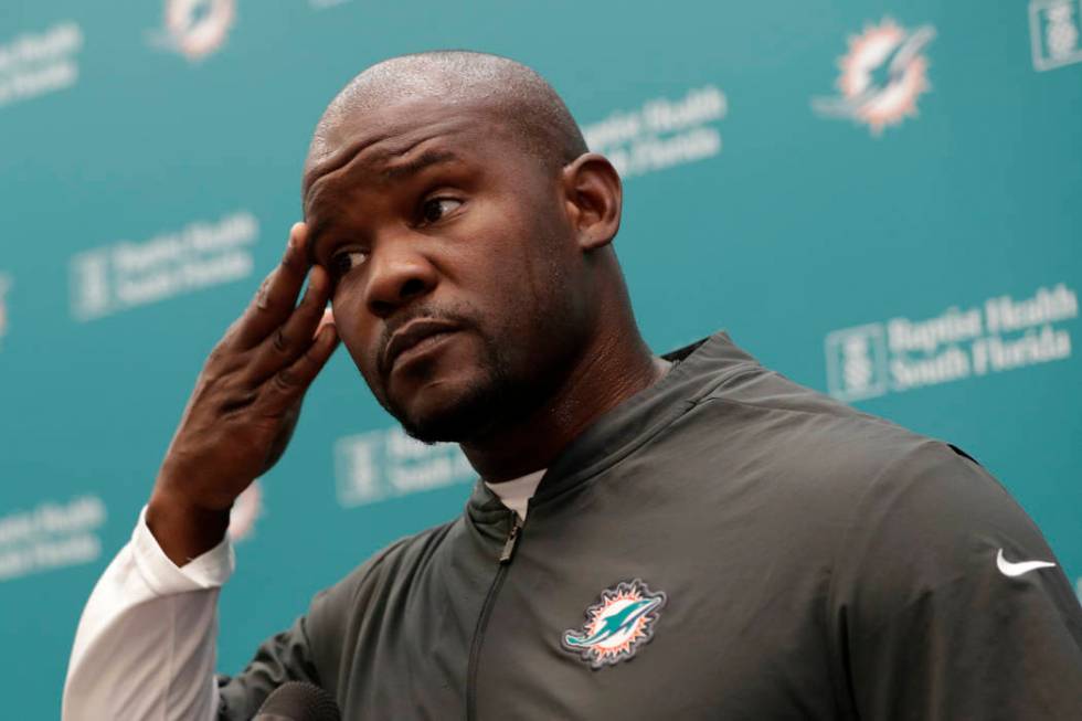 Miami Dolphins head coach Brian Flores speaks during NFL football training camp in Davie, Fla. ...