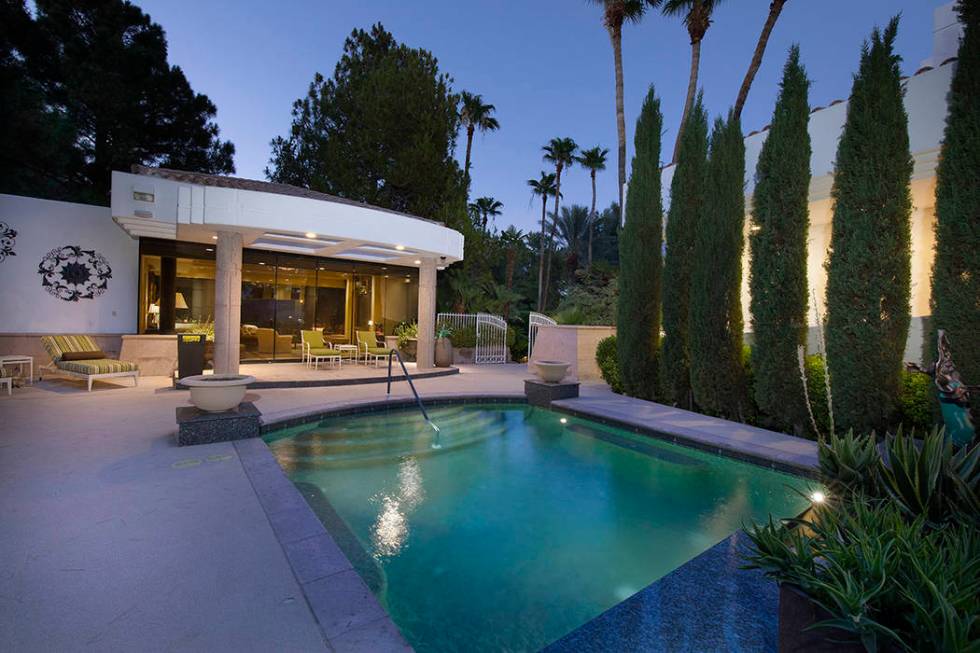 The guest house is near a small pool. (Synergy Sotheby’s International Realty)