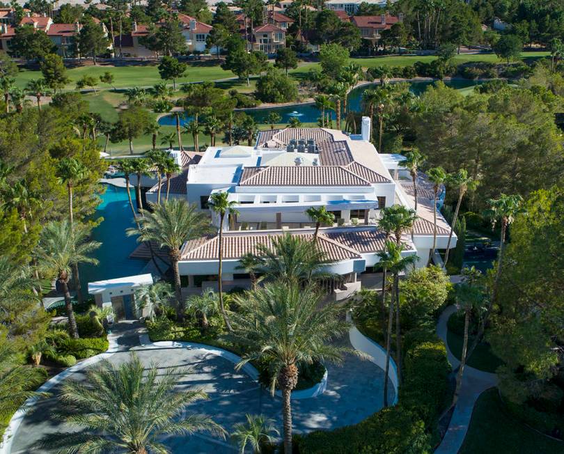 The home is on the golf course. (Synergy Sotheby’s International Realty)