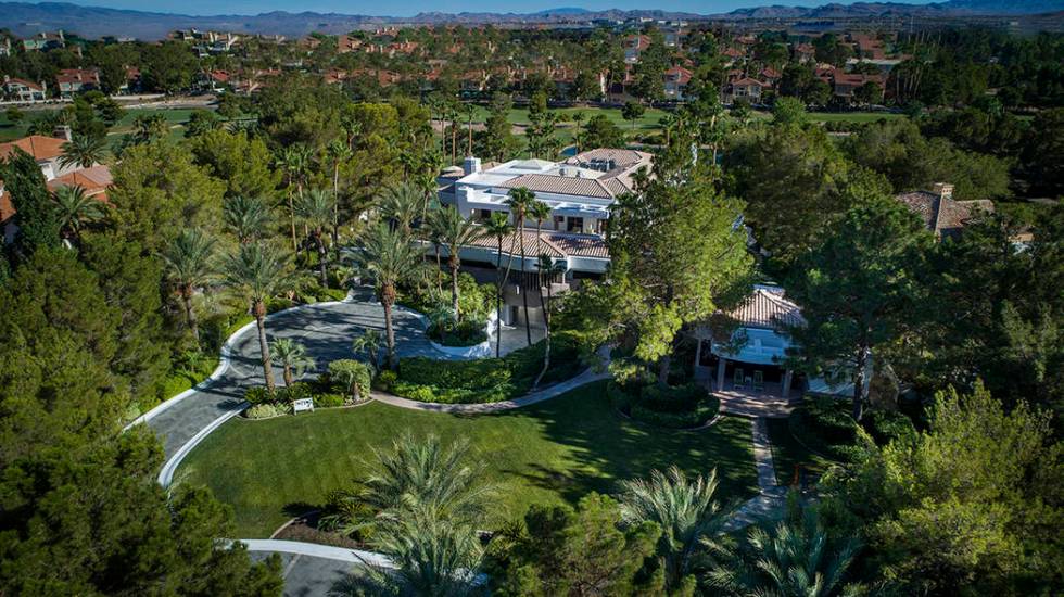 This 20,000-square-foot Spanish Trail Country Club home is listed for $18.5 million. (Synergy S ...