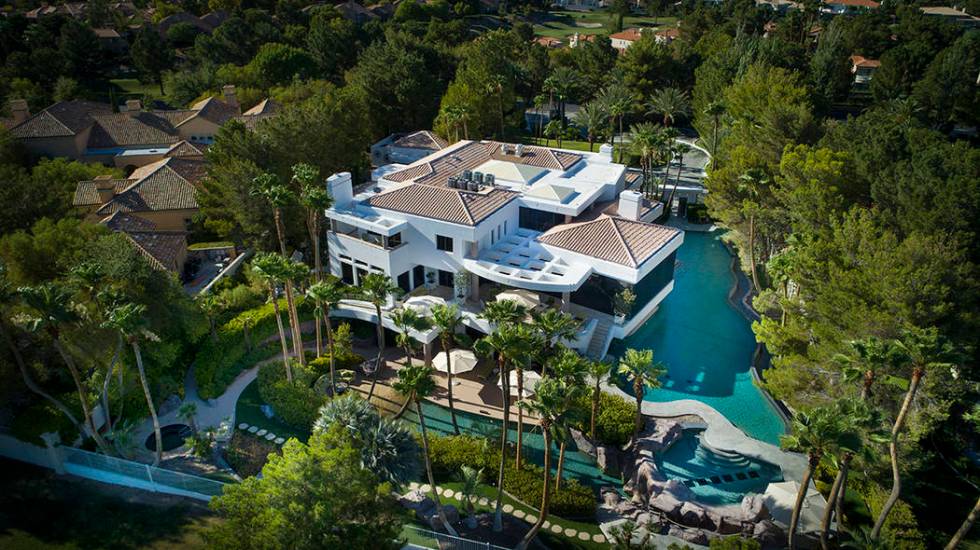 This 20,000-square-foot Spanish Trail Country Club home is listed for $18.5 million. (Synergy S ...