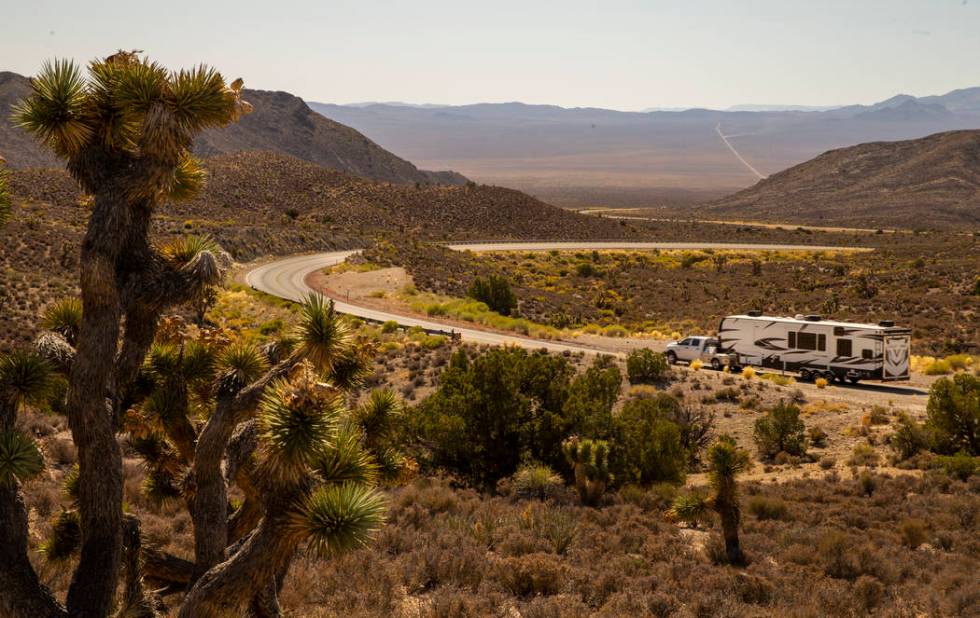 A camper heads over the Hancock Summit along the Extraterrestrial Highway which could be a chok ...