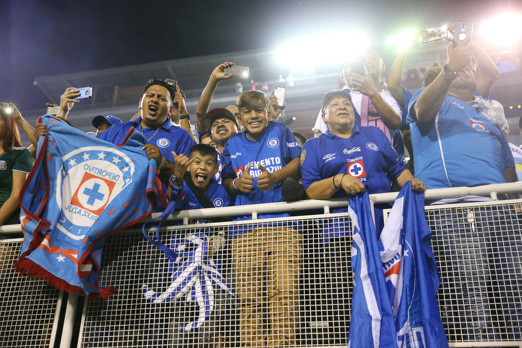 Fans celebrate their team Cruz Azul winning 2-1 against Tigres in the Leagues Cup Final soccer ...