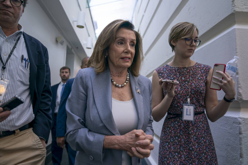 Speaker of the House Nancy Pelosi, D-Calif., arrives for a closed-door meeting with the House D ...