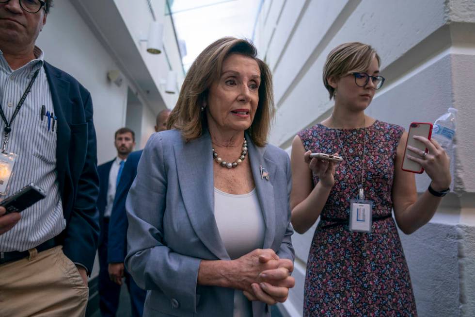 Speaker of the House Nancy Pelosi, D-Calif., arrives for a closed-door meeting with the House D ...