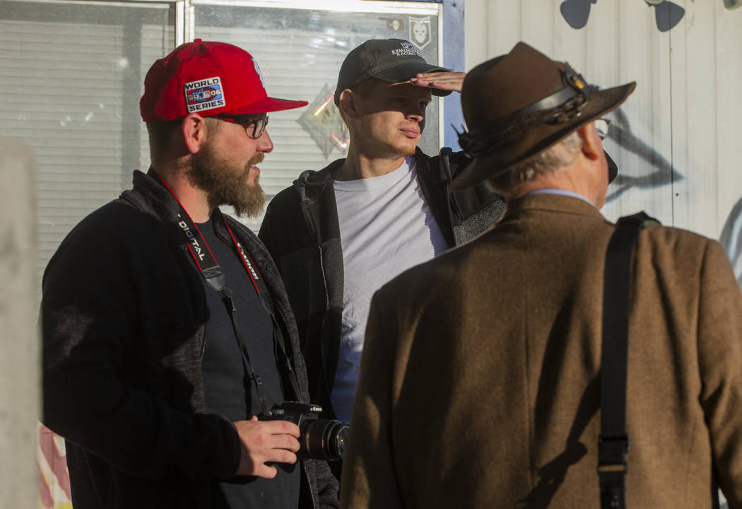 Dustin Goodwin of Houston, left, and friend Jared Shelter of Oklahoma City wait outside the Lit ...