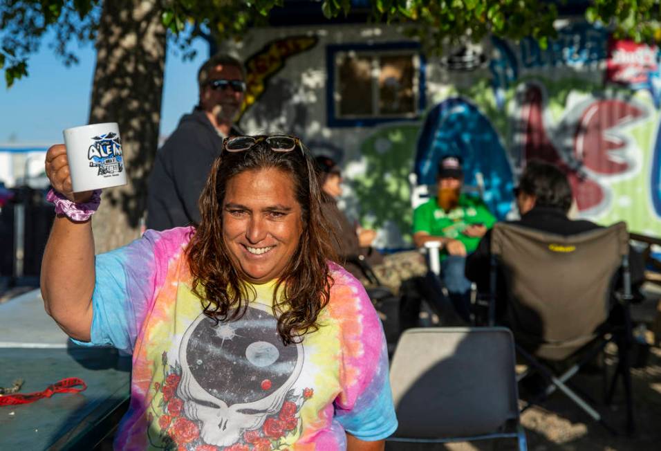 Connie West of the Little A'Le'Inn greets the day as the restaurant behind will serve coffee an ...