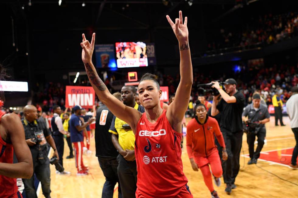 Washington Mystics guard Natasha Cloud gestures as she walks off the court after Game 2 of the ...