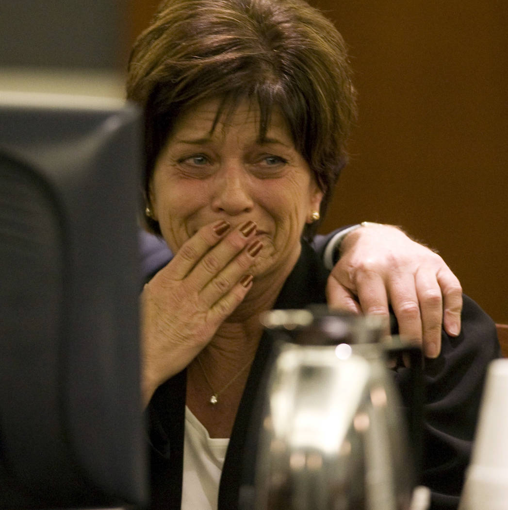 Sheri Weiss cries while a verdict in read in Clark County District Court on Feb. 27, 2009. The ...