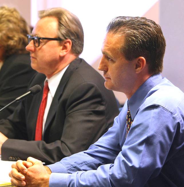 Chiropractor Stephen Shaw, right, appears before the Nevada Chiropractic Physicians Board with ...