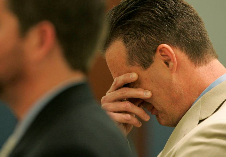 Chiropractor Stephen Shaw, right, weeps at the Regional Justice Center in Las Vegas on May 25, ...