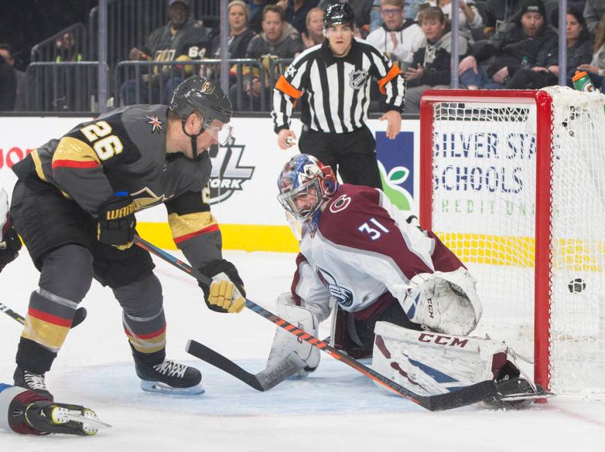 Golden Knights center Paul Stastny (26) scores a first period goal past Colorado Avalanche goal ...