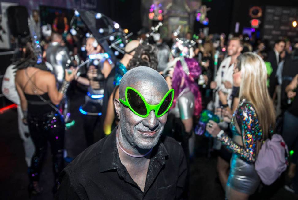 Seth Stylz dresses as a silver and green alien during a pre-party for Storm Area 51 on Thursday ...